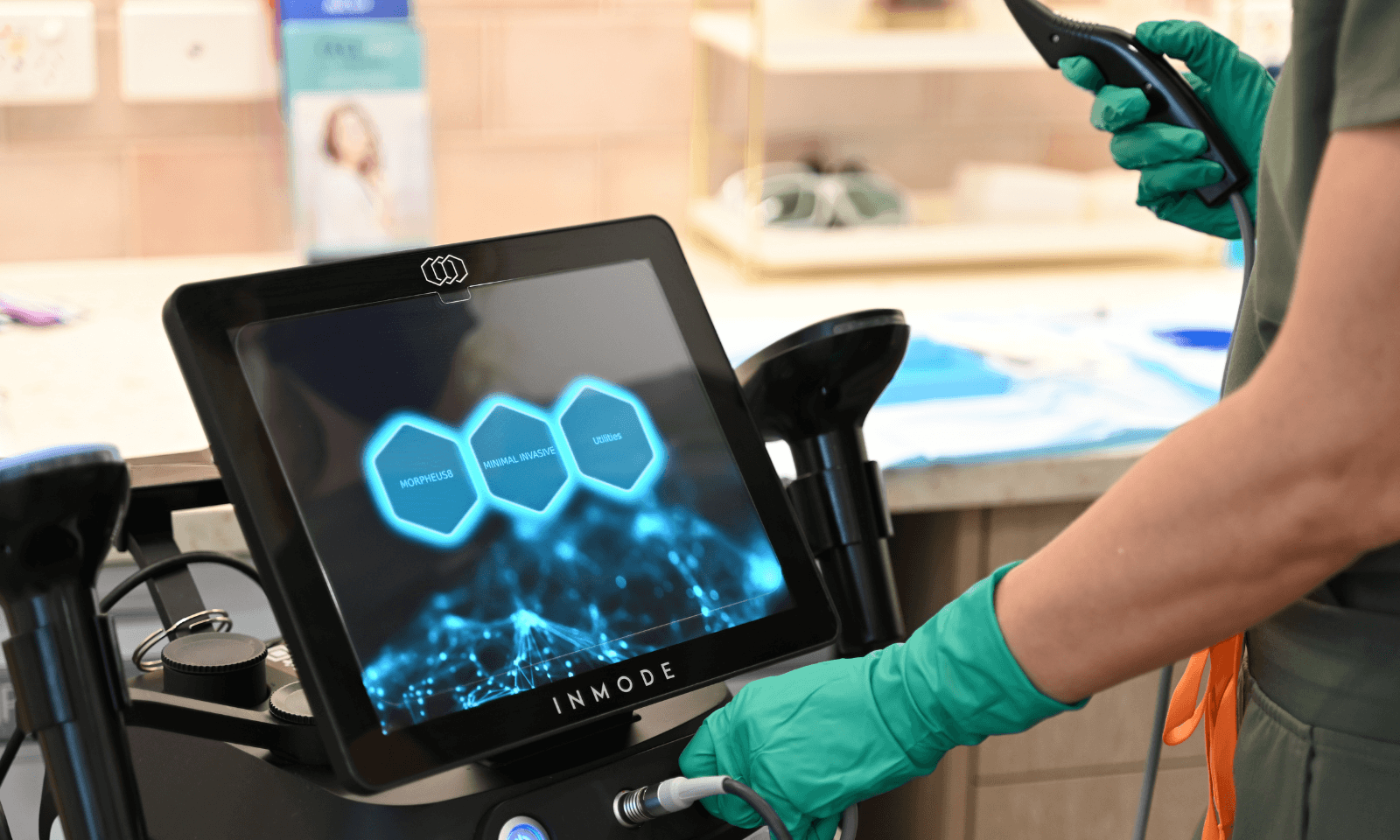 Clinical device used during a FaceTite procedure shown in a treatment room setting.